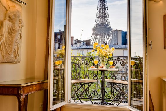 Enjoy breakfast on the balcony with Eiffel Tower views