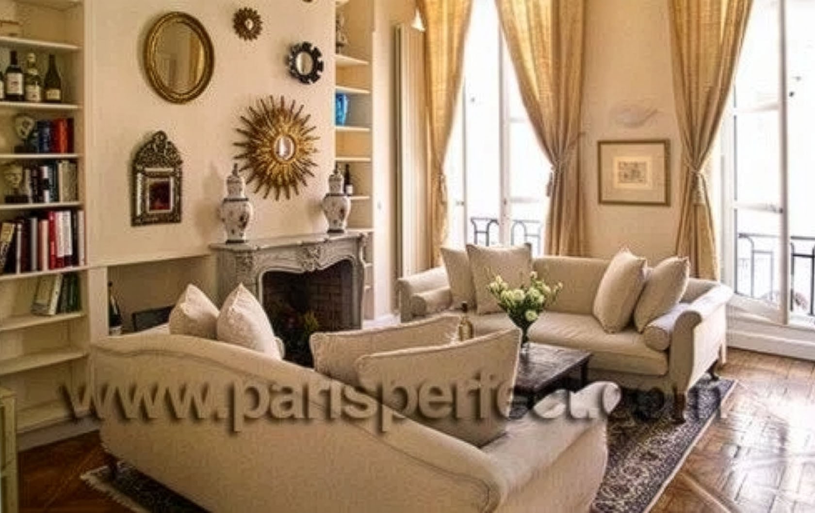 The sunny and beautiful living room of our 3 bedroom Clos Jolie vacation rental