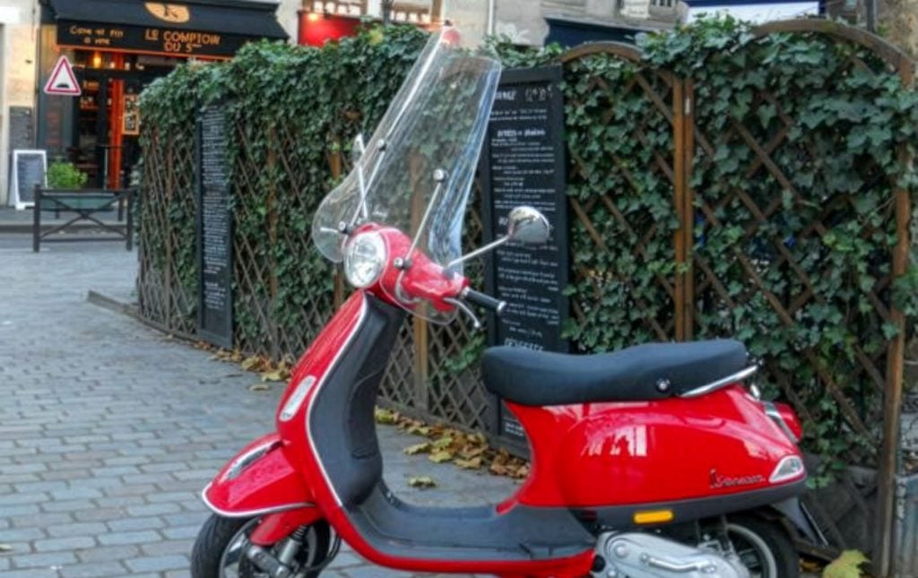A bright red Vespa spotted in the 5th arrondissement