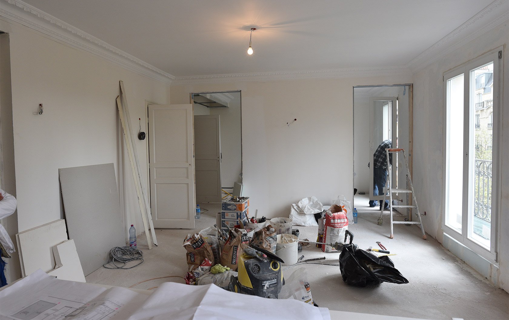 3b1-Merlot-works-view-of-living-room-towards-master-bedroom