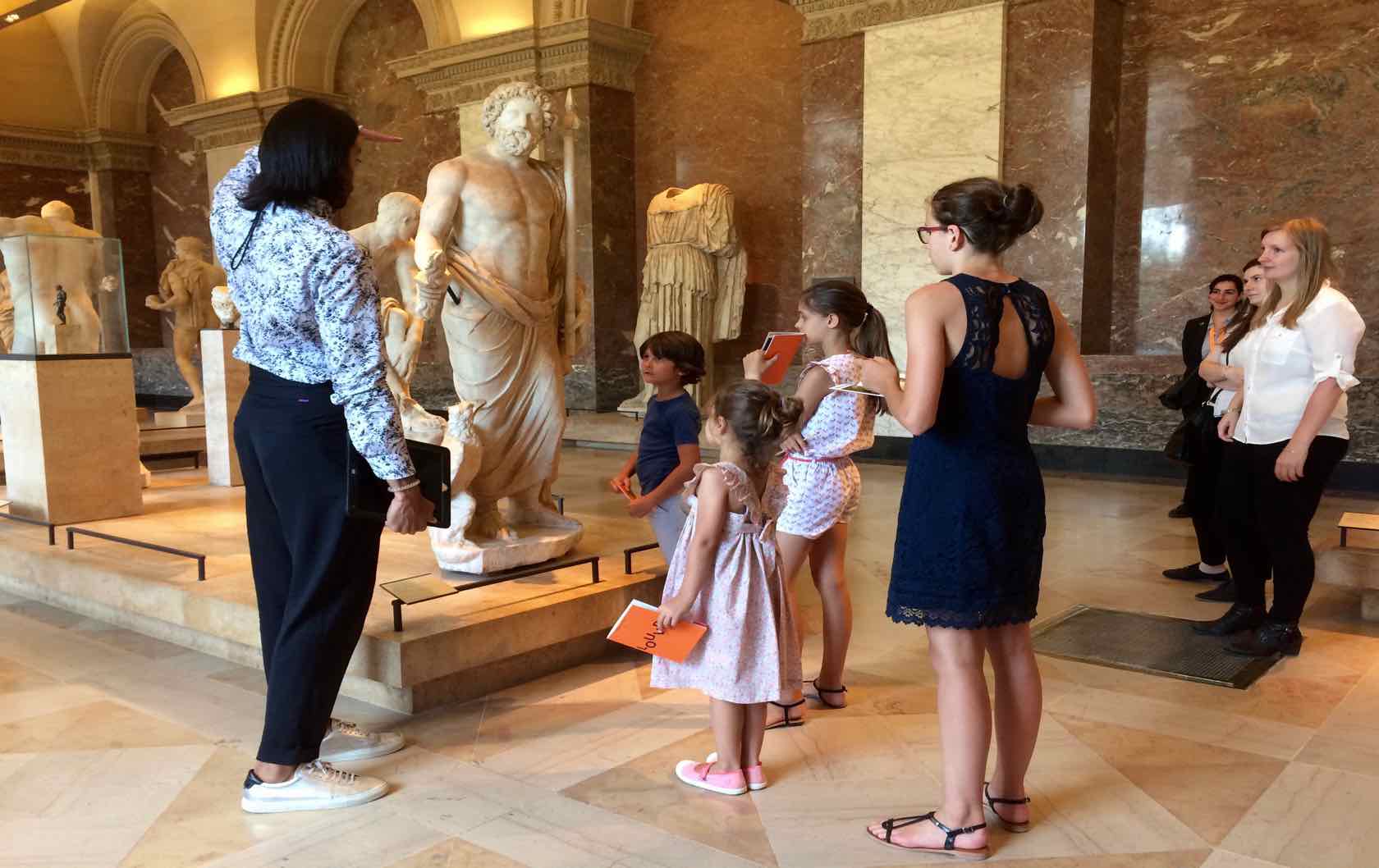 Fun things to do with the Family in Paris during the Summer by Paris Perfect kids at the Louvre