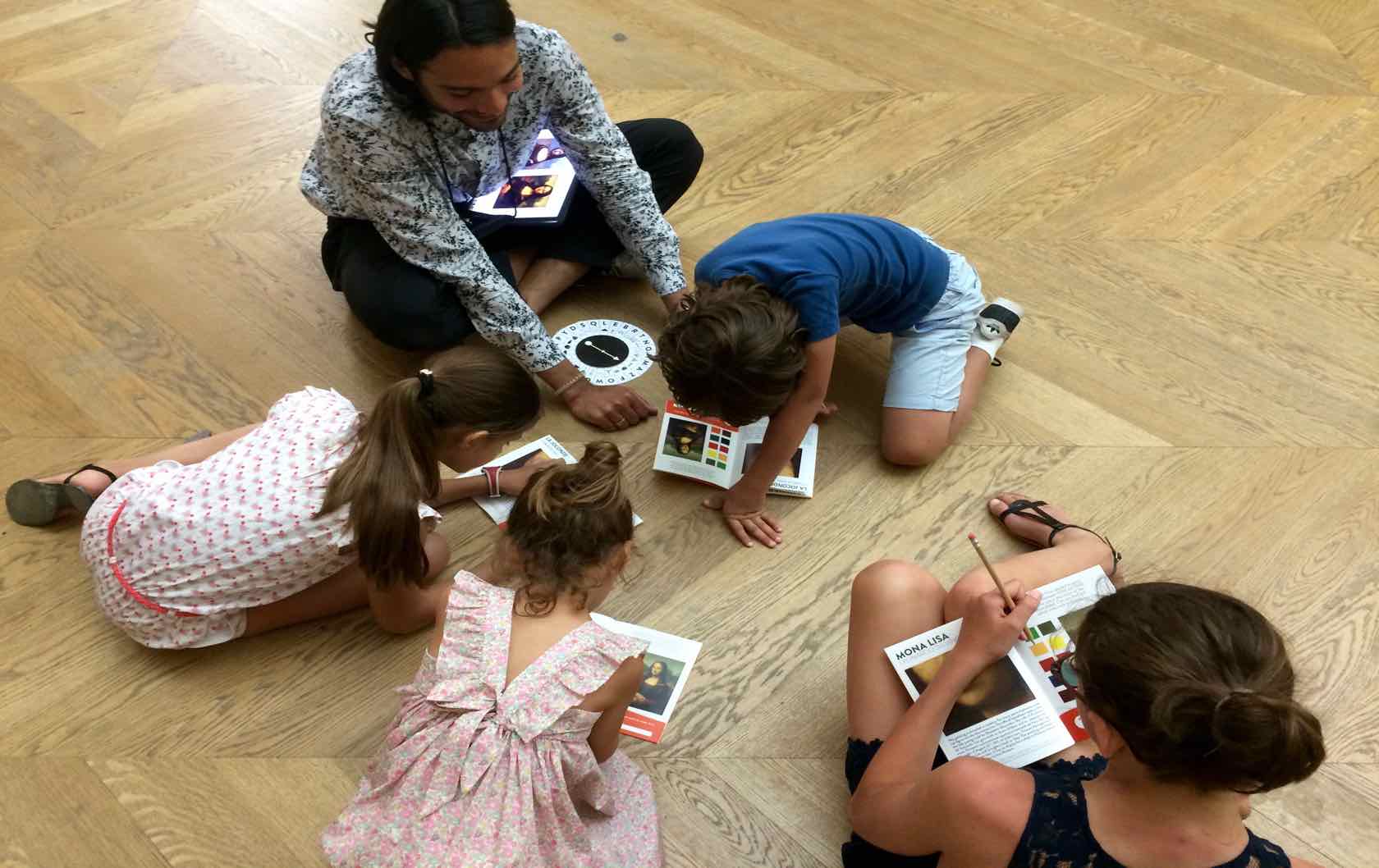 Fun things to do with the Family in Paris during the Summer by Paris Perfect kids at the Louvre