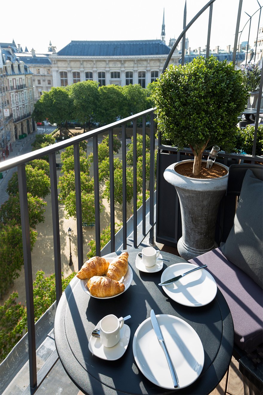 View of Place Dauphine from the Monbazillac apartment- 25 Place Dauphine- 7 of Our Most Instagrammable Apartments in Paris by Paris Perfect