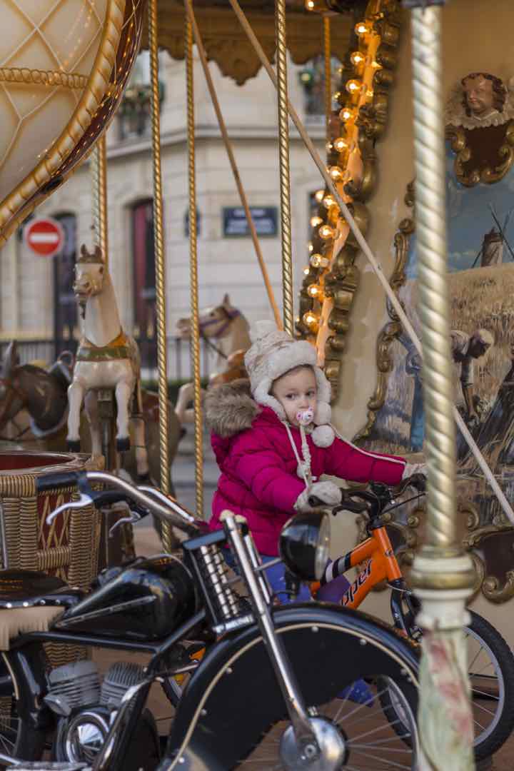 Visit Paris in the Winter Child on caroucel