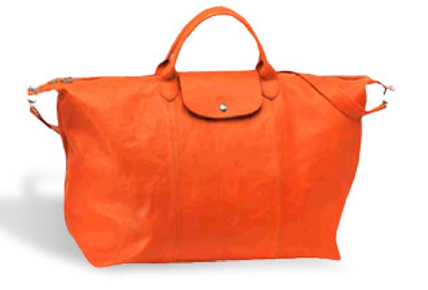 Longchamp’s Famous Le Pliage Bag Now in Leather!
