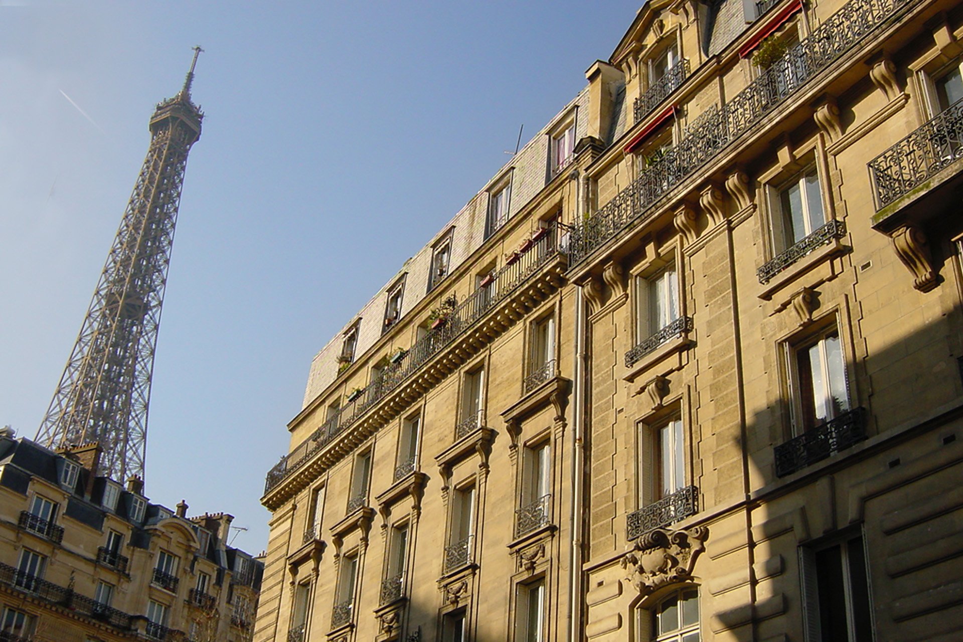 View of the apartment building from the street.