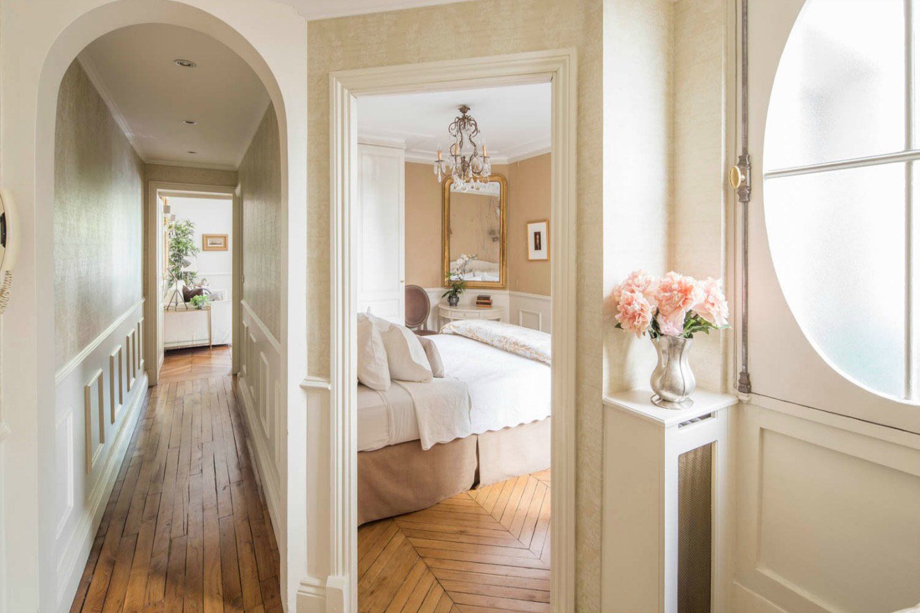 Open the pretty double French doors to the living room