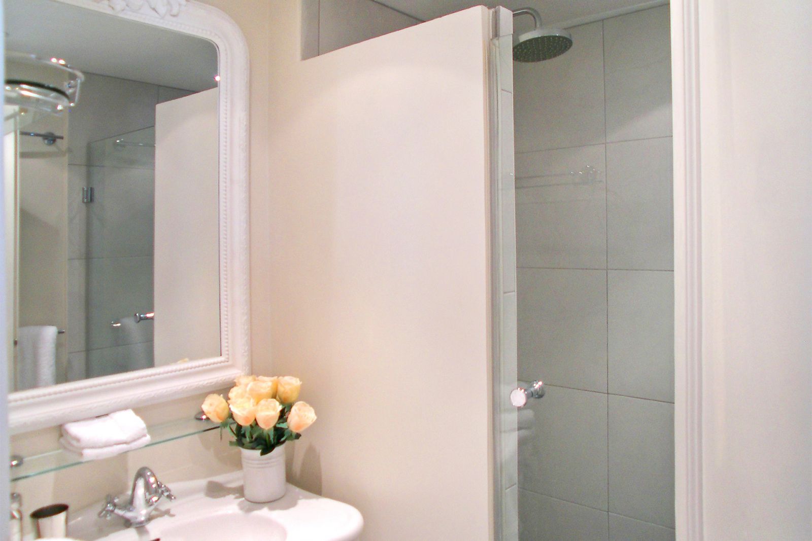 Modern enclosed shower in the second bathroom